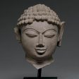 A mottled red sandstone head of a Jina, India, 11th 12th century CE Cheap