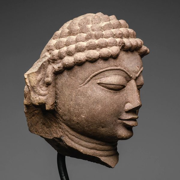 A mottled red sandstone head of a Jina, India, 11th 12th century CE Cheap