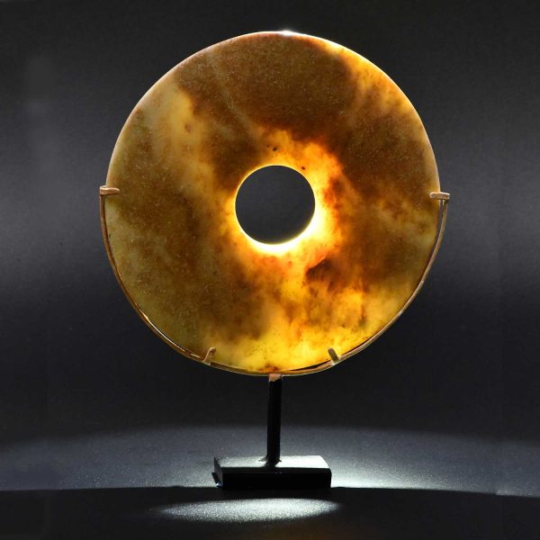 A Chinese Mottled Nephrite Jade Bi Disc, Late Neolithic Period, ca. 3000 - 2000 BCE Sale